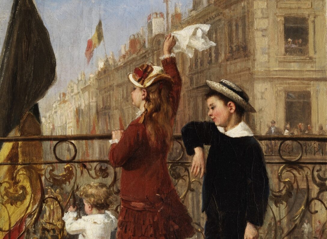 Child waving at a French celebration
