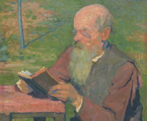 Old man reading outside